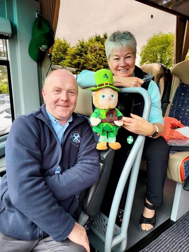 Photo of Mary Nolan of Tours Galore with bus driver Michael.